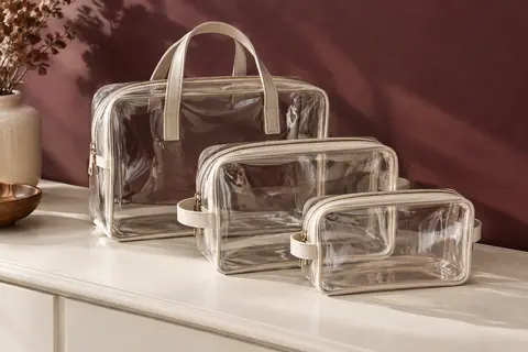 Trois trousses de toilette transparentes Aucuu de formats différents, avec poignées et fermetures zippées en métal