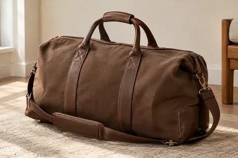 Grand sac de voyage en toile brun café avec poignées, bandoulière amovible et garnitures façon cuir